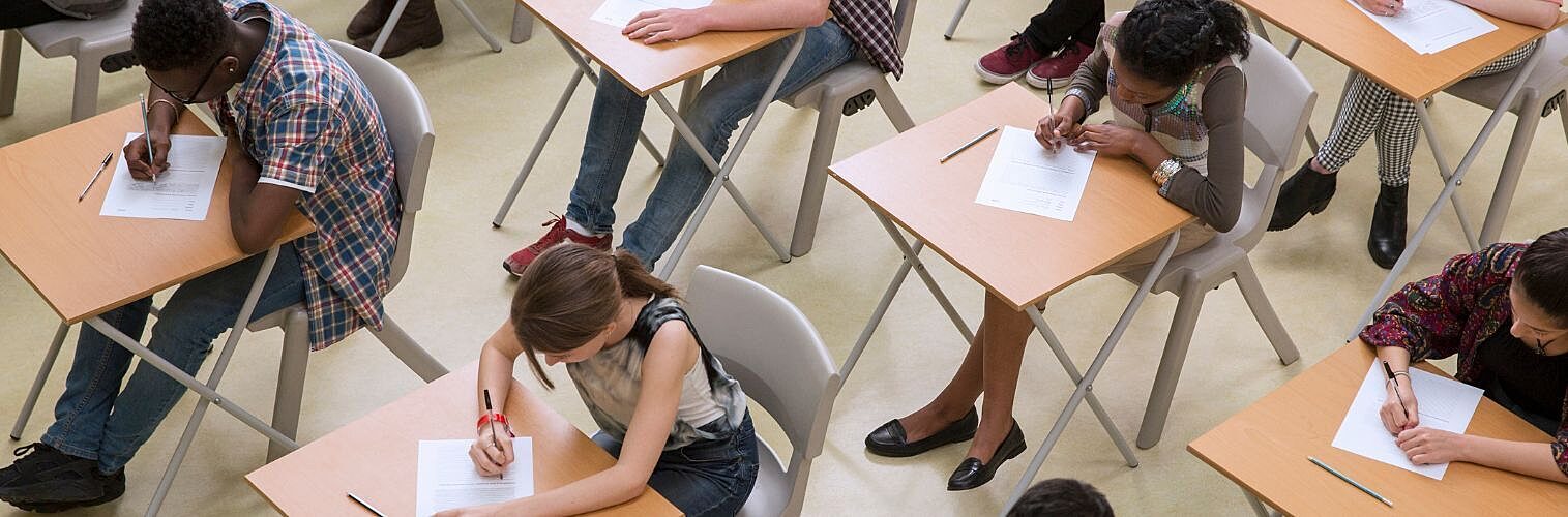 Elevated view of students taking their exams.