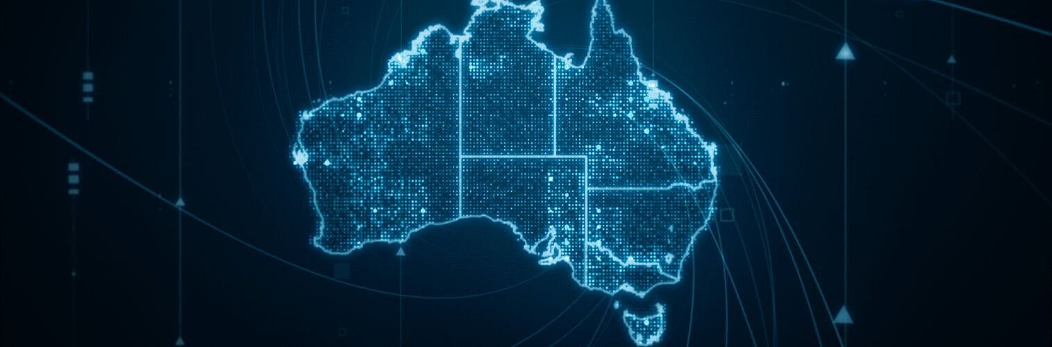 A glowing digital map of Australia displayed with futuristic technology lines.