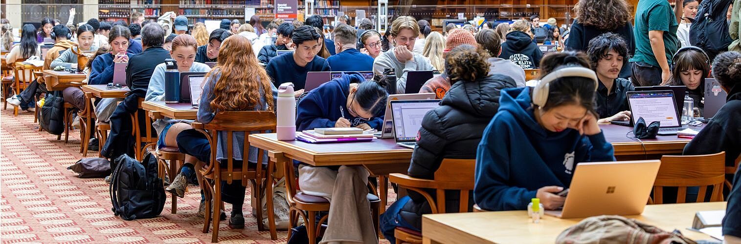 State library of NSW with students studying before exams.