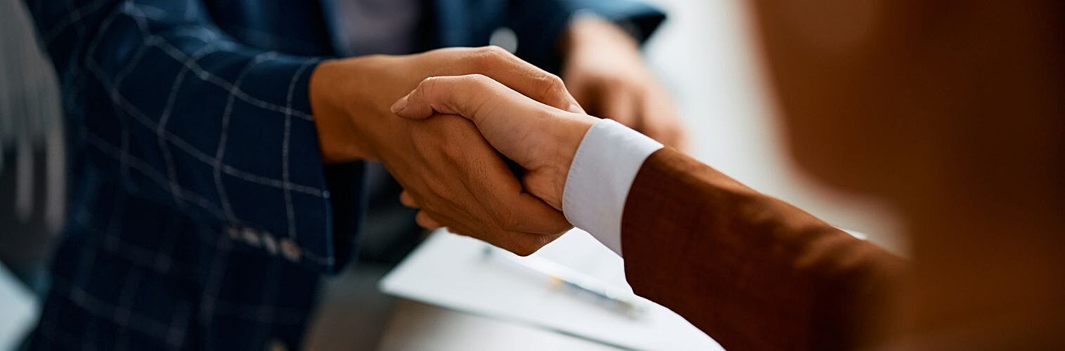 Hand shake over a business deal.
