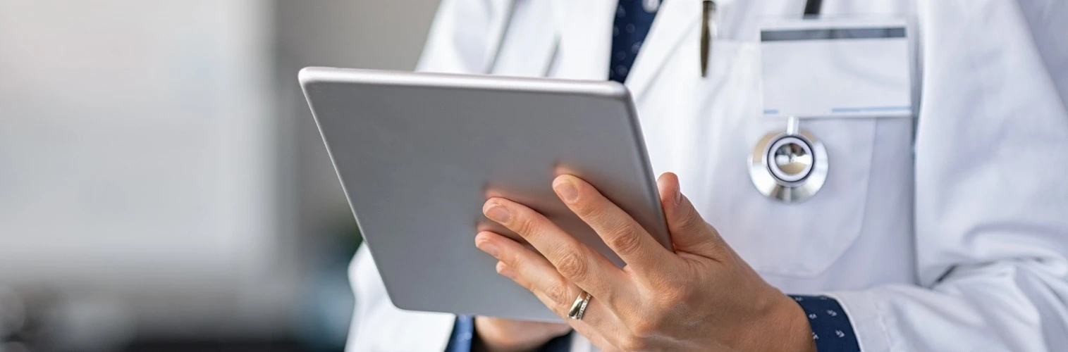 A doctor and a tablet device