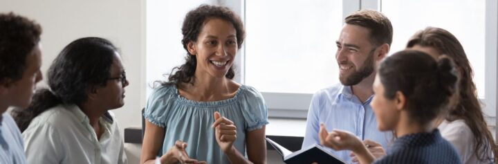 Small group of colleagues sitting in an informal meeting