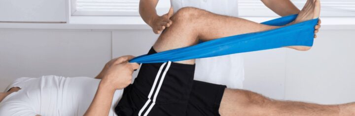 Close up of physical therapist working with a patient