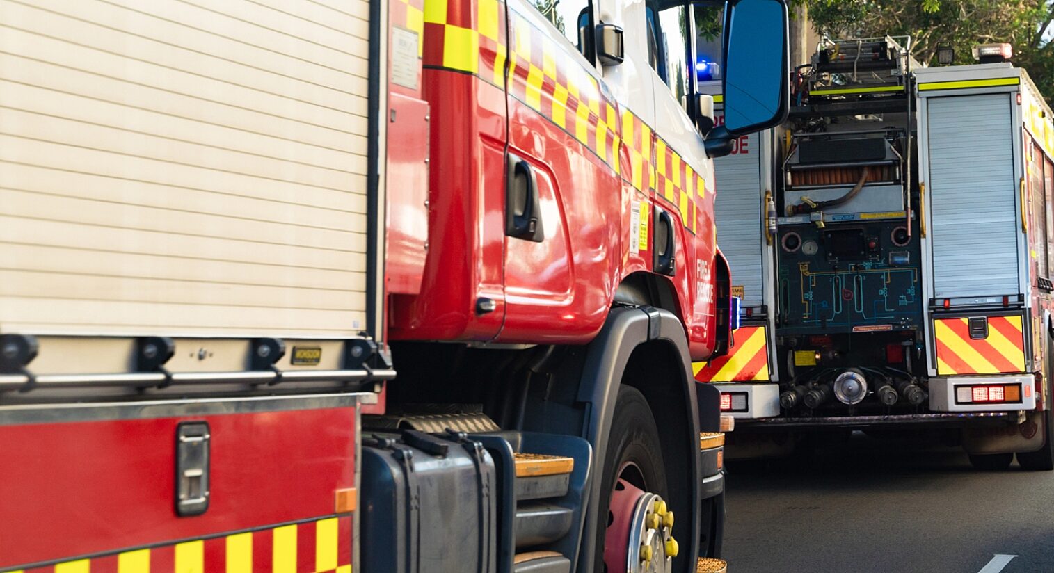 Close up of two parked fire trucks